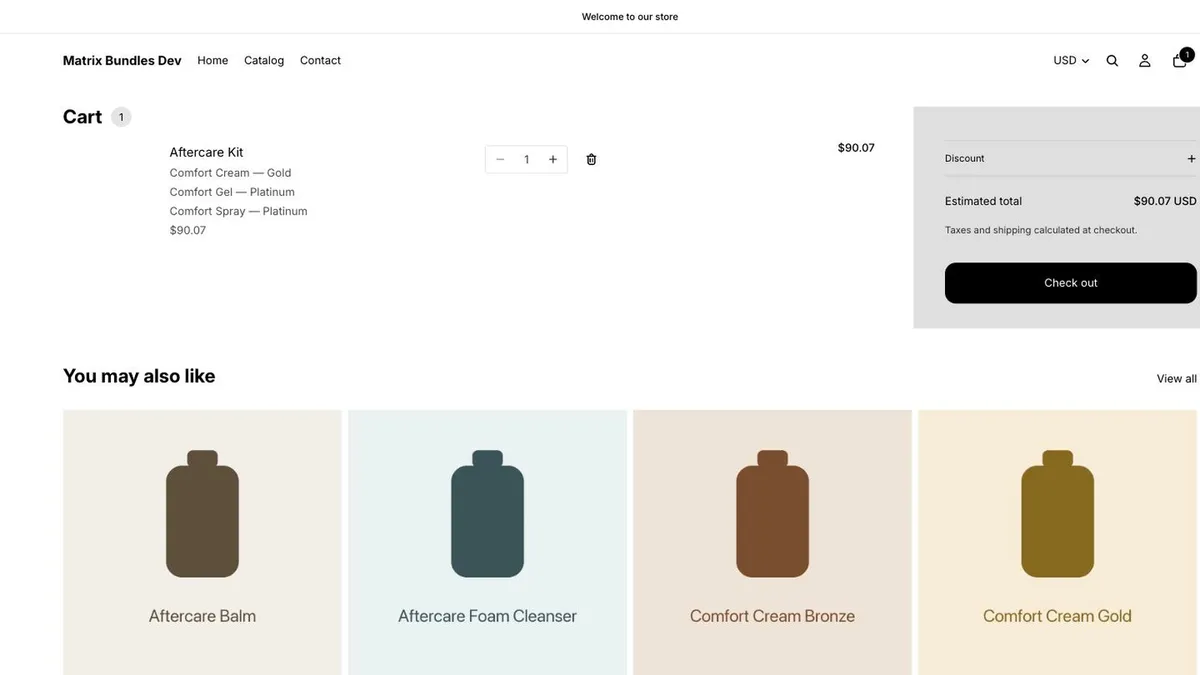 The cart with one line, “Aftercare Kit”, listing the three products inside it — Comfort Cream Gold, Comfort Gel Platinum and Comfort Spray Platinum — at one price of $90.07.